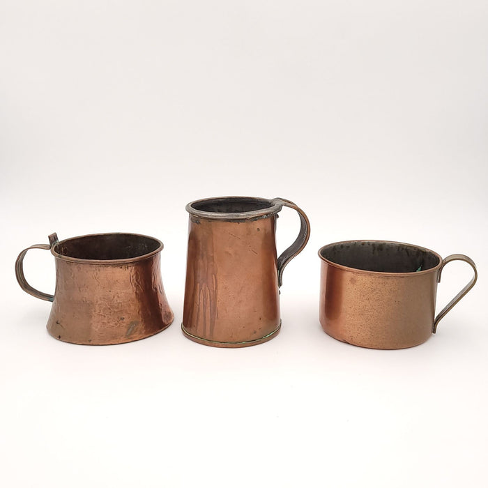 Assembled Set of Three Copper Cups, England, 19th century