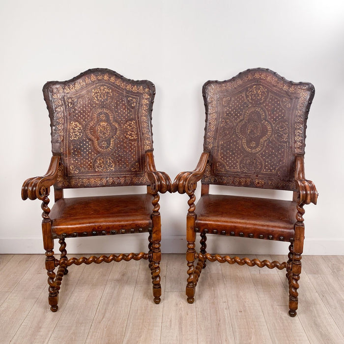 Pair of Italian Oversized Carved Baroque Style Thrones in Gilt Tooled Leather, circa 1860