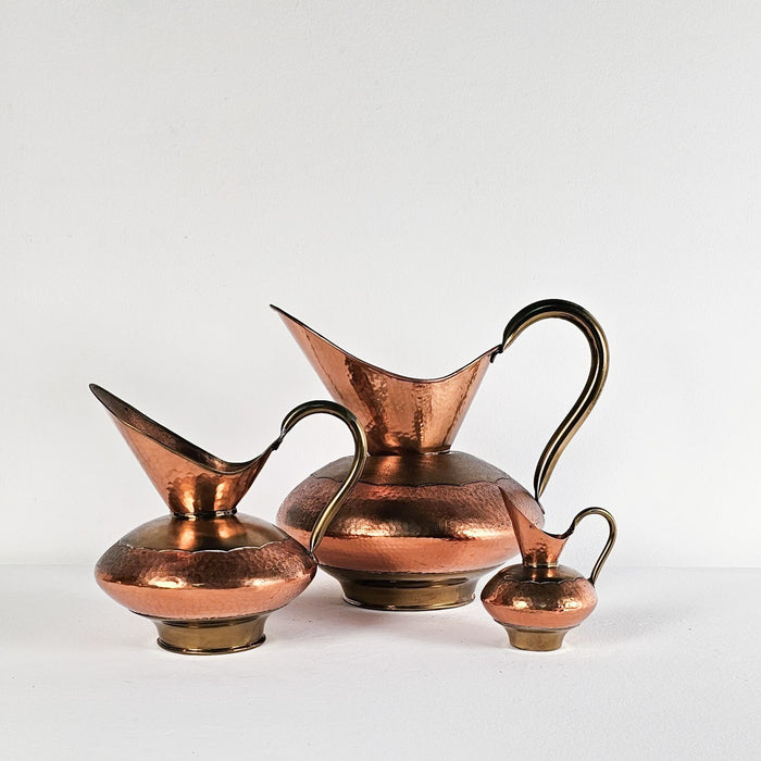 Set of Three Vintage Copper Pitchers