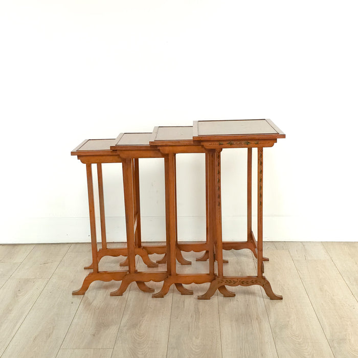Four Satinwood Fancy Painted Nesting Tables, England, 19th century
