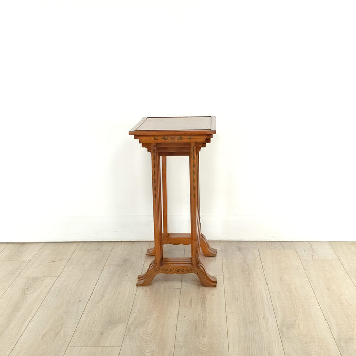 Four Satinwood Fancy Painted Nesting Tables, England, 19th century