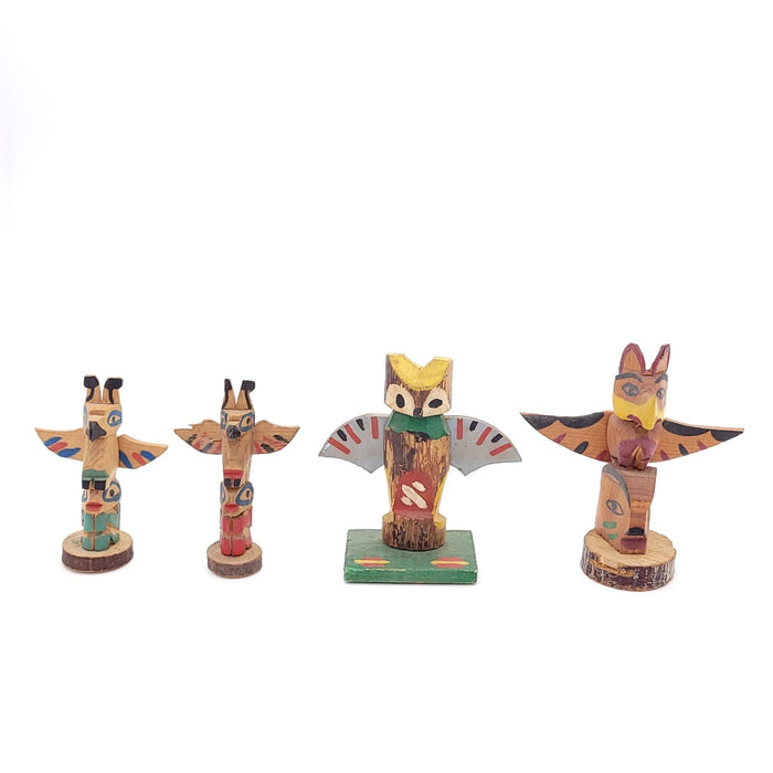 Group of Four Vintage Small Totem Poles